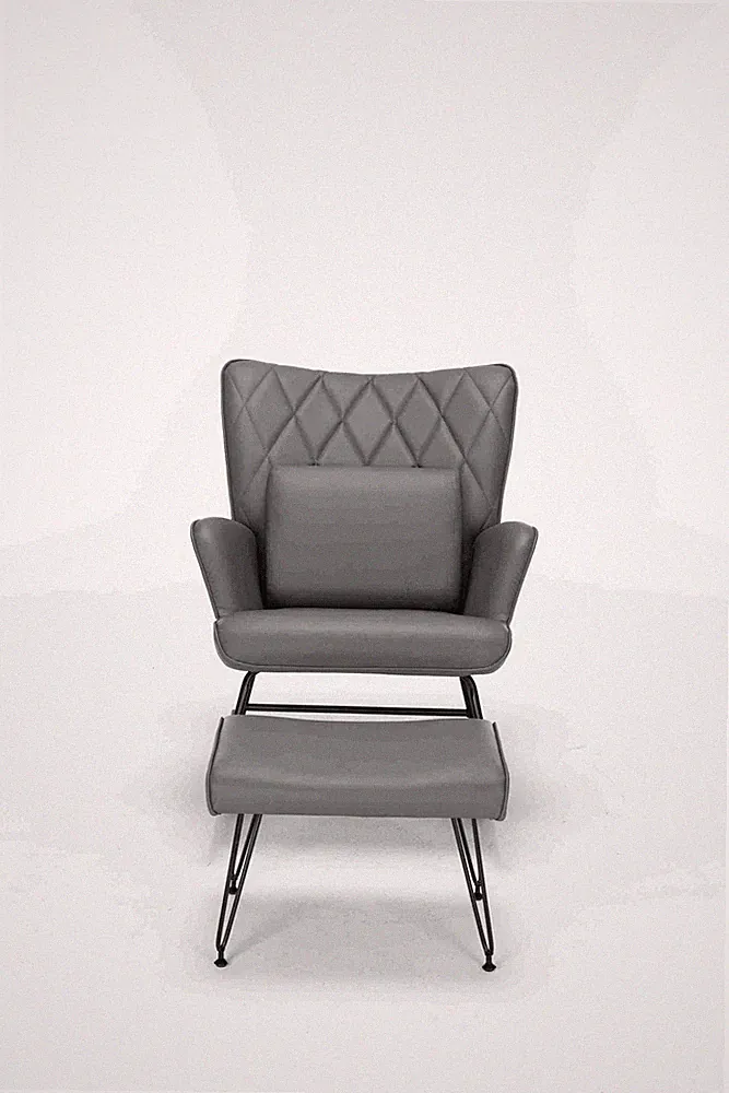 A rocking chair with a lumbar pillow and Ottoman style